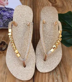 Gold flip flops